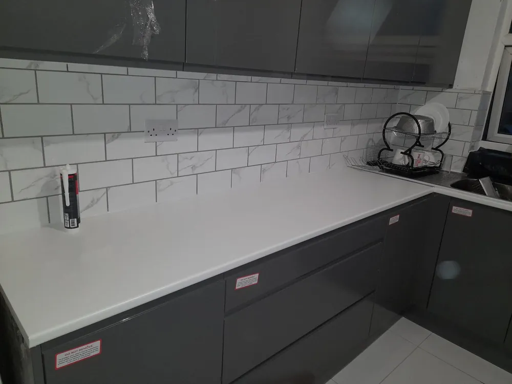 Kitchen worktop and tiled splashback